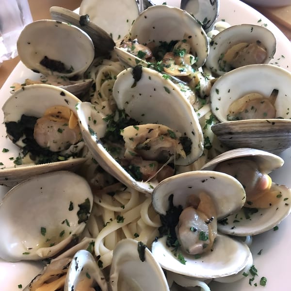Close-up of Angelina's Trattoria's linguine with clams, garnished with fresh parsley.